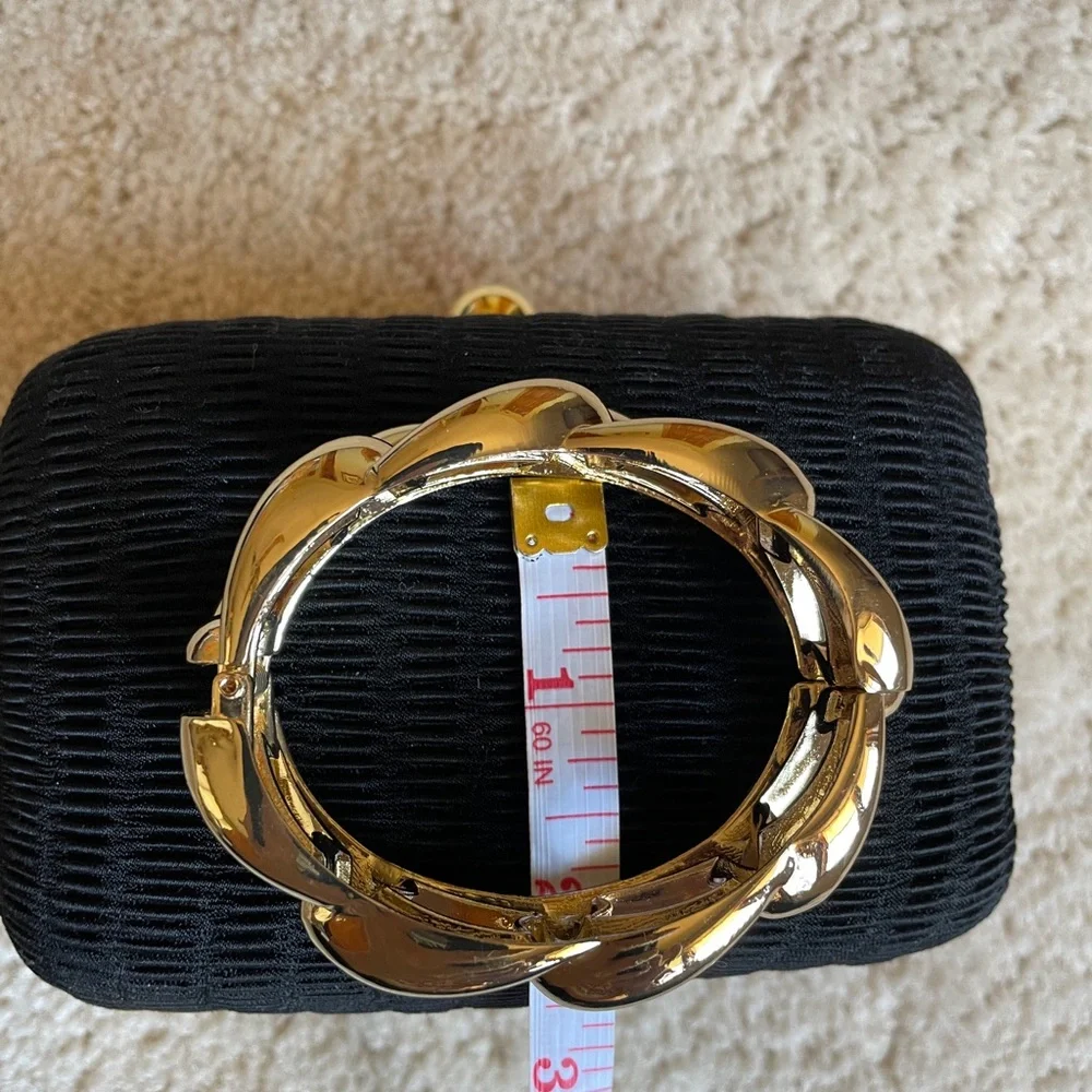 EUC Women’s Gold-tone Chunky braided cuff bracelet.